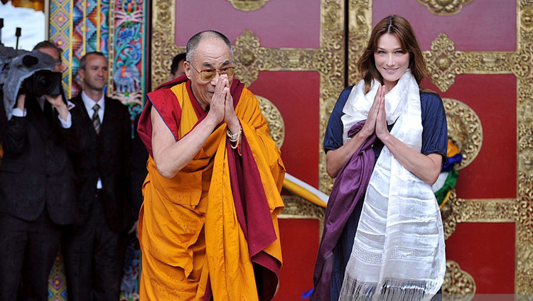 His Holiness the Dalai Lama with First Lady of France Carla Bruni Sarkozy at the inauguration of the Lerab Ling Temple in Roqueredonde, France on August 22, 2008.